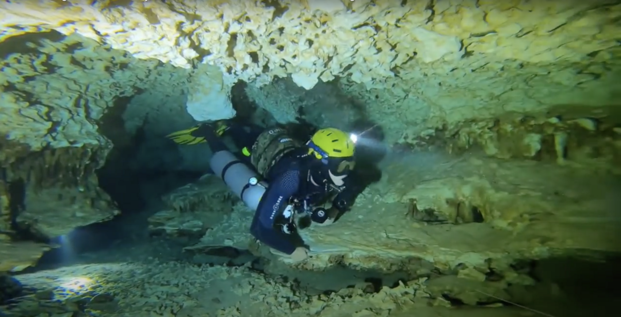 A cave diver on a guideline